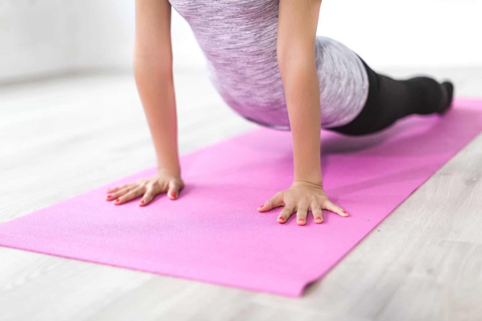 A person stretching during a movement session